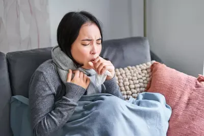 asian-woman-coughing-feeling-sick-sitting-blanket-with-scard-cold-apartment-saving-heati.webp