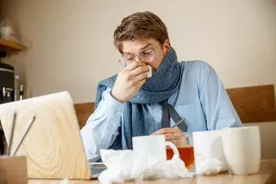 sick-man-while-working-office-businessman-caught-cold-seasonal-flu-(1).webp